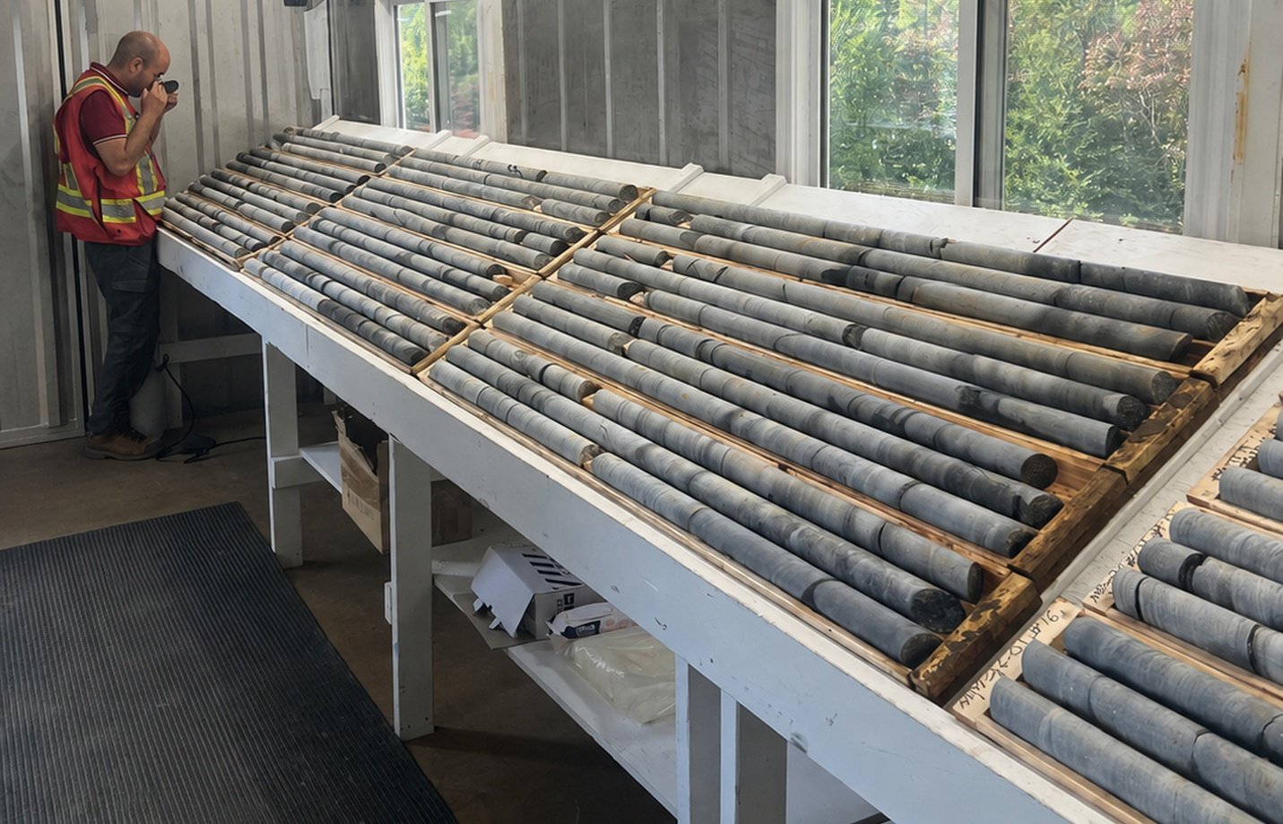 Drill core samples laid out on core racks at the Montauban mine property, Québec