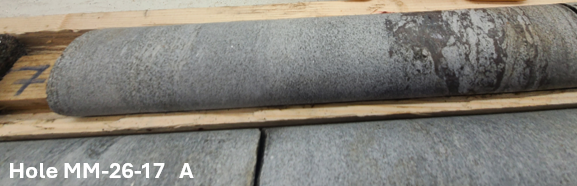 Drill core from ESGold hole MM-26-17 (photo A), showing quartz-carbonate veining with visible sulphides
