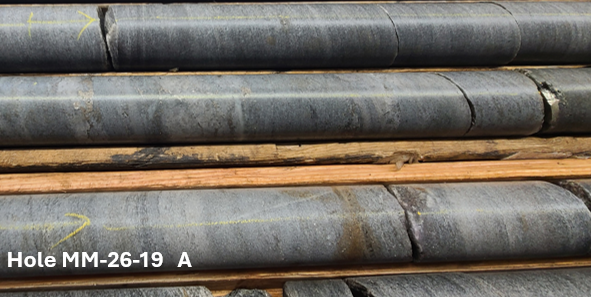 Drill core from ESGold hole MM-26-19 (photo A), 42.4 to 43.8 metres, showing quartz-carbonate veins with pyrrhotite and pyrite